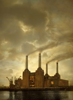 Smoke billowing from factory smokestacks