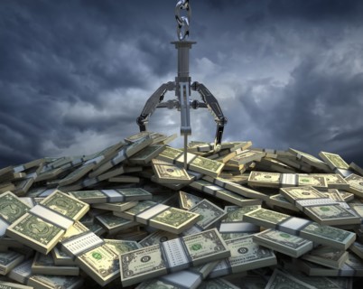 Claw grabbing at bundles of one dollar bills