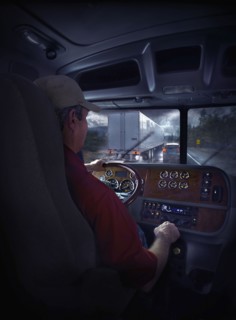 Trucker driving on freeway