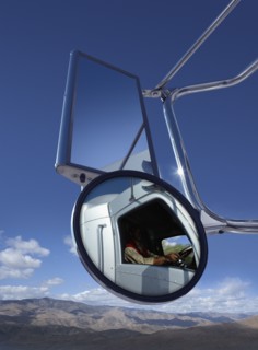 Trucker reflected in side mirror