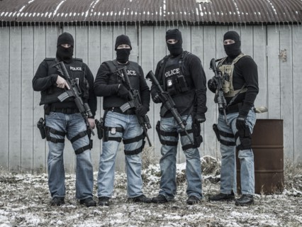Police snipers standing together outdoors