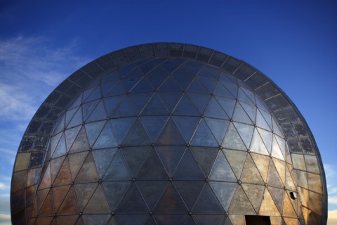 Metal observatory under blue sky