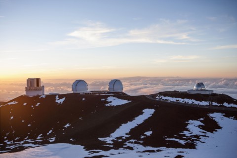 Observatory and silos on snowy mountaintop