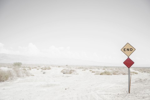 End road sign on remote dirt road