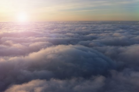 High angle view of sky above clouds