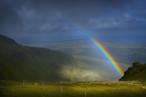 Rainbow over rural landscape