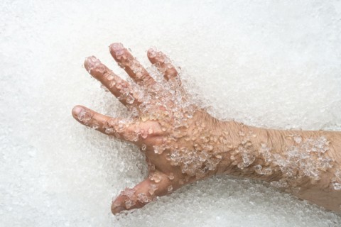 Arm of man on ice