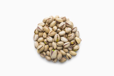 Pile of pistachios in shape of a circle