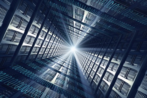Light shining from binary code and computer servers