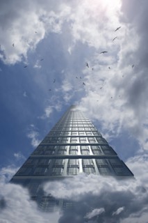 Birds flying around computer server in clouds