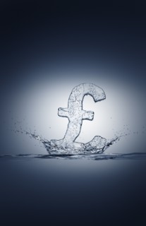 Water droplets splashing from ice British pound symbol