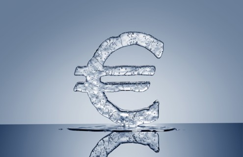 Puddle under melting ice euro symbol