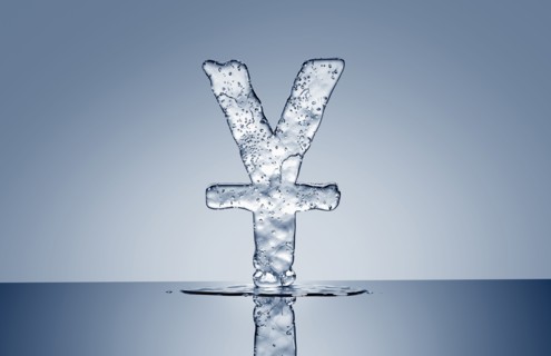 Puddle under melting ice yuan symbol