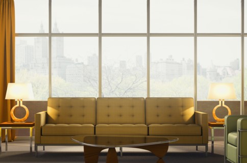 Sofa and armchair in modern penthouse apartment