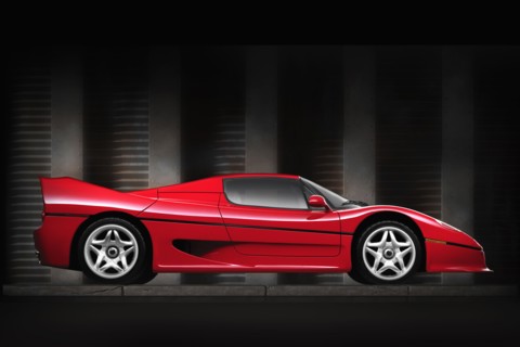 Side view of shiny red sports car