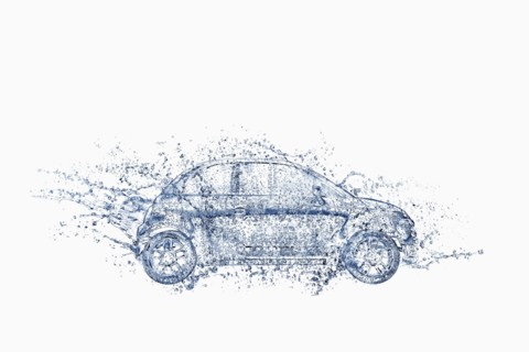 Splashing water droplets surrounding car