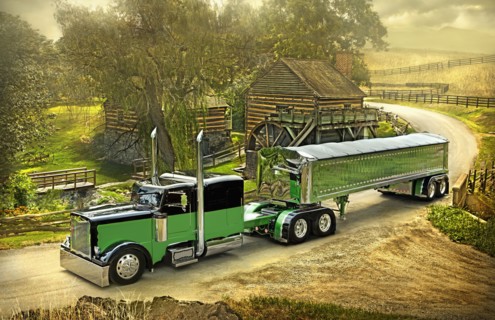 Semi-truck driving on rural road