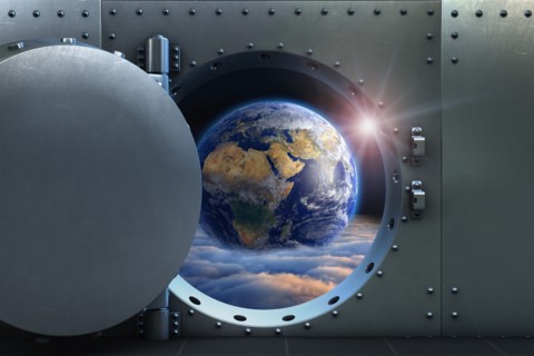 Open vault door revealing earth above clouds