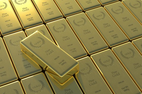 High angle view of gold bars and yuan symbol