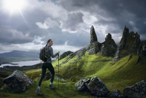 Caucasian woman hiking in rocky landscape