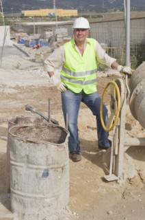 Hispanic construction worker standing on construction site