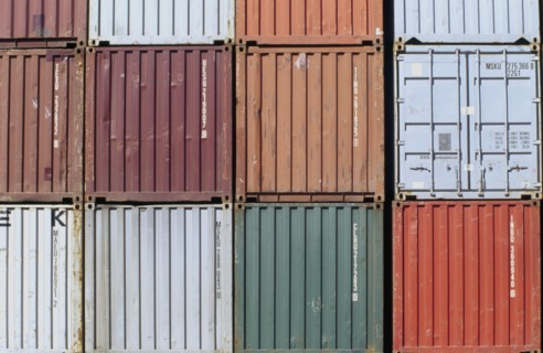 Row of shipping containers close-up