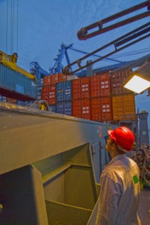 seaman watching container being loaded