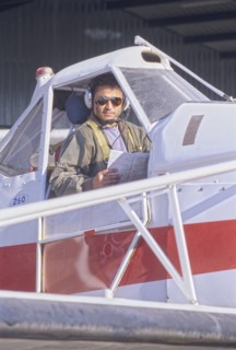 Pilot Sitting in a Cockpit of a Private Plane