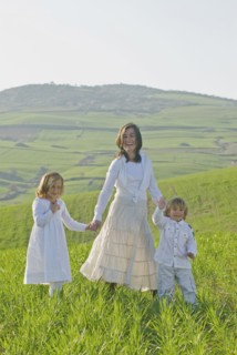 happy family in green fields