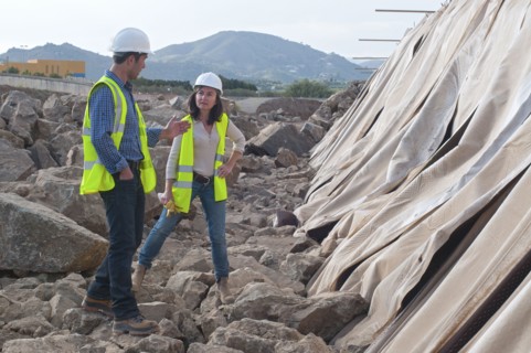 male and female engineers in construction site
