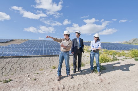 engineers and businessman in solar plant