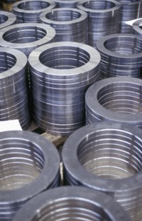 High angle view of stacked metal coils in factory