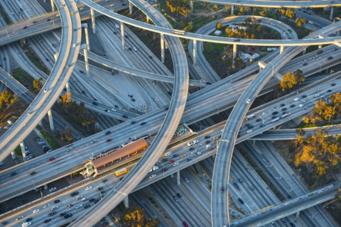 Aerial view of highway interchange in cityscape