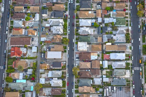 Aerial view of houses in suburban cityscape