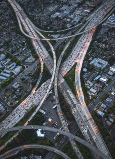 Aerial view of highway interchange in cityscape