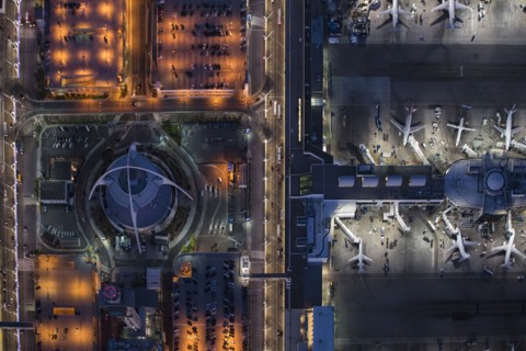 Aerial view of airplanes parked in airport gate