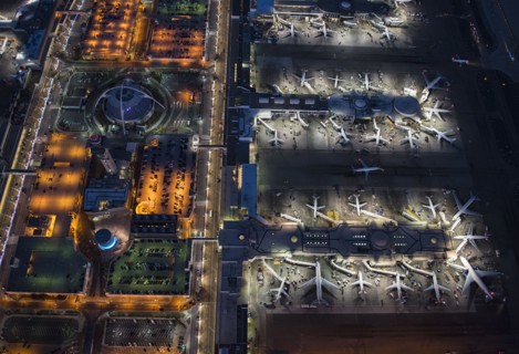 Aerial view of airplanes parked in airport gates