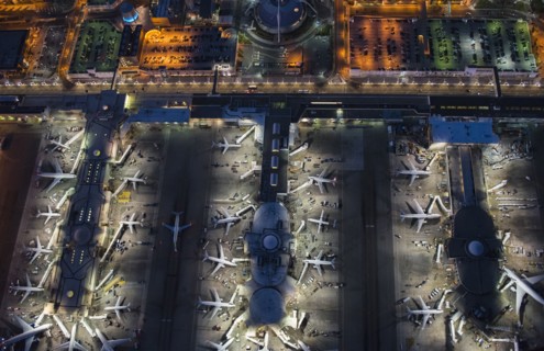 Aerial view of airplanes parked in airport gates