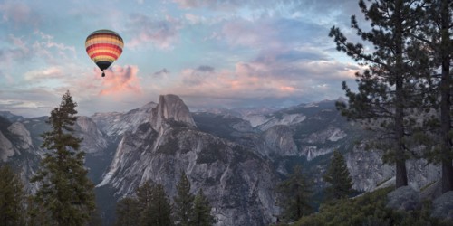 Hot air balloon flying over Yosemite