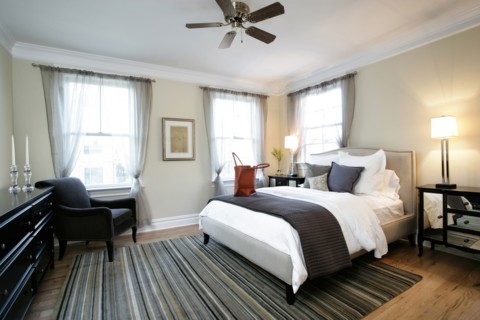 Bed and armchair in modern bedroom