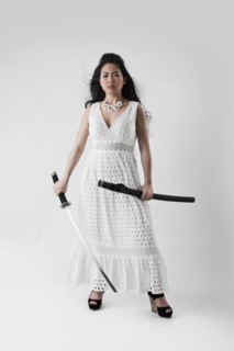 Asian woman holding sword