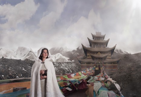 Caucasian woman standing near monument