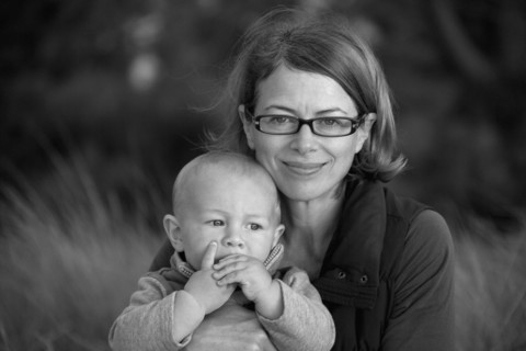 Portrait of smiling Caucasian mother holding baby son