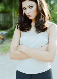 Woman standing with arms crossed