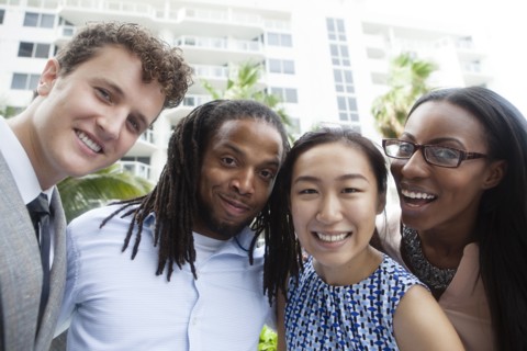 Business people smiling outdoors
