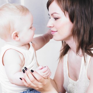 Mother admiring baby son