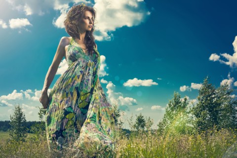 Caucasian woman standing in rural field