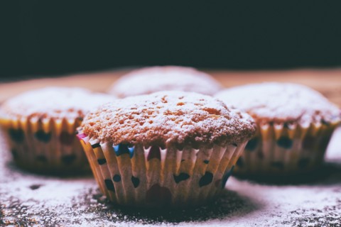 Close up of cupcakes covered with powdered sugar
