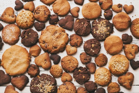 Variety of cookies on wooden table