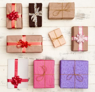 Wrapped gifts on wooden table